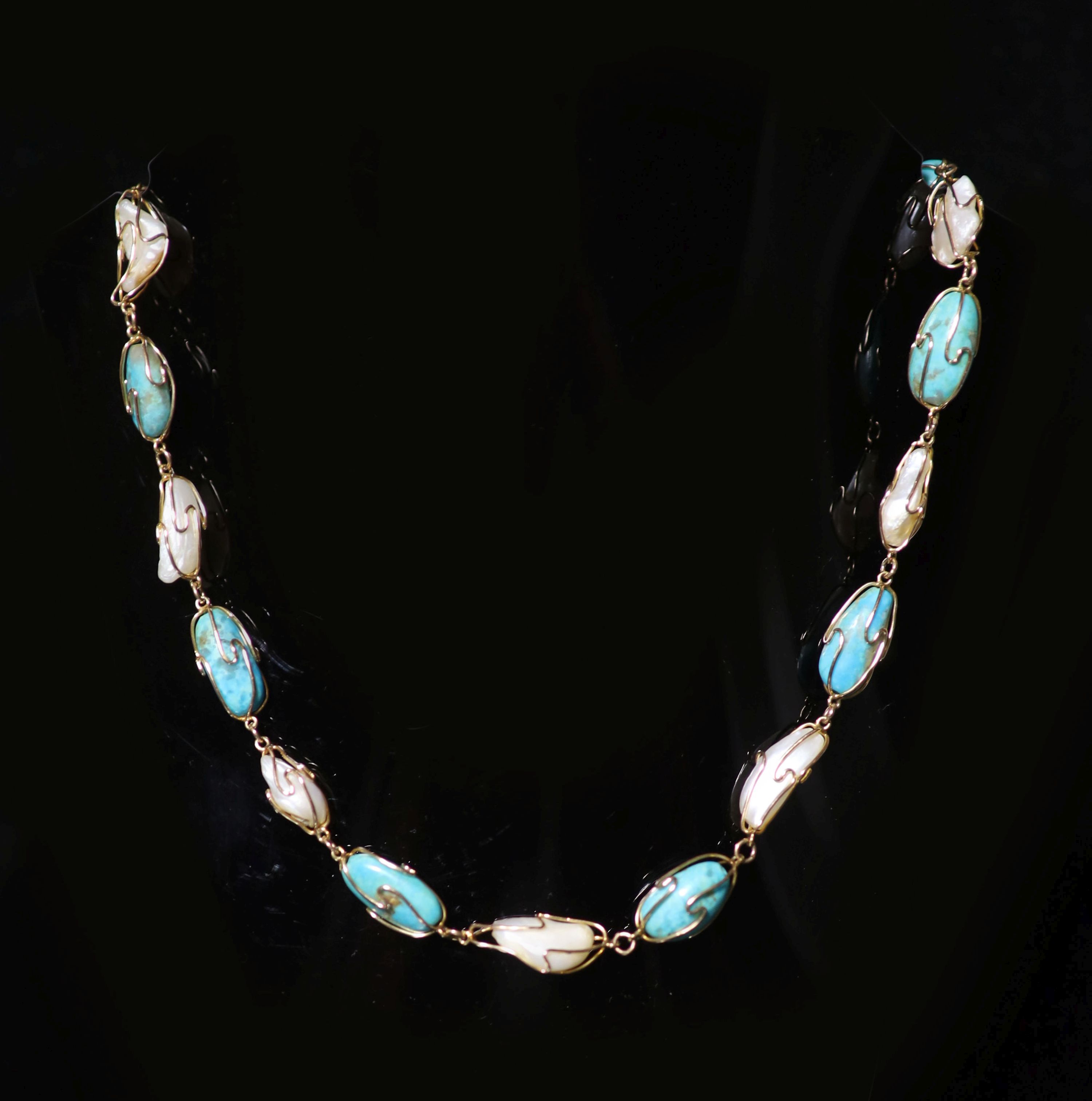 An early 20th century Liberty & Co? 15ct gold, baroque pearl and oval turquoise bead set necklace